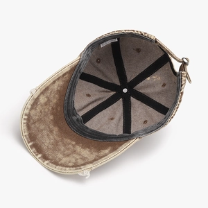 Distressed cotton baseball cap with vintage worn details and adjustable metal buckle back