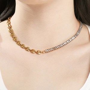 Detail of gold coffee bean chain and rectangle zircon tennis necklace worn on neck