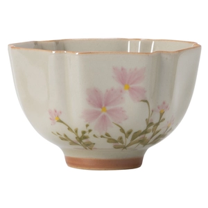 Japanese style ceramic daisy teacup with scalloped rim on a clean white background