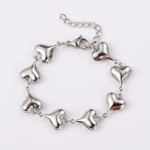 Close-up of heart-shaped links on adjustable 304 stainless steel silver bracelet