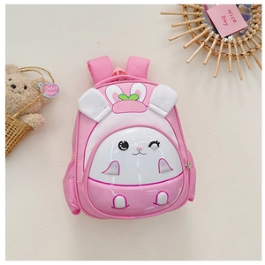 Front view of pink kids backpack featuring a 3D cute white bunny design on hard shell