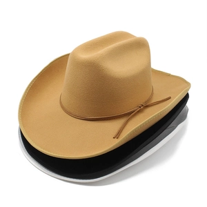 Classic wide brim wool felt cowboy hats shown in camel, black and white stack