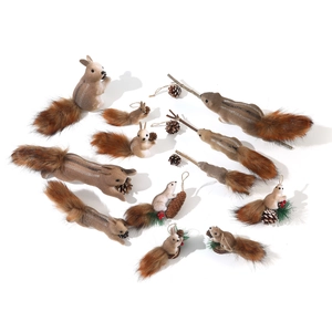 Brown faux fur squirrel ornaments in various poses with pine cones for Christmas decor