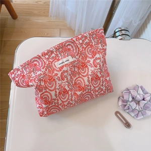 Floral cotton toiletry bag detail with vintage flower pattern and simple wish woven label