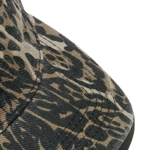 Close-up of leopard print pattern and high-quality stitching on the cotton baseball cap brim