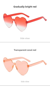 Side view of rimless heart-shaped sunglasses in gradient red and coral orange shades