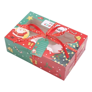 Christmas cupcake gift box with clear window, red ribbon and festive patterns