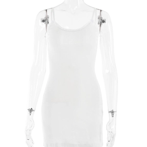 Detailed view of white ribbed knit fabric texture on a sleeveless V-neck mini dress