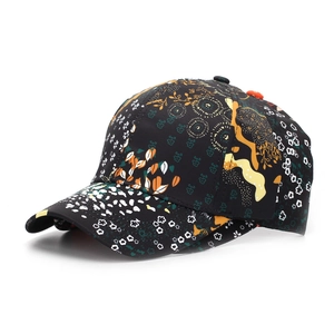 Detail of colorful ethnic print and floral pattern on a black stylish baseball cap