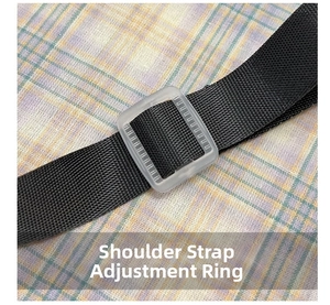 Detail of adjustable black nylon shoulder strap with a frosted buckle on checkered fabric