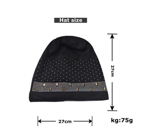 Detailed dimensions of black knit beanie with silver rhinestones and gold accents