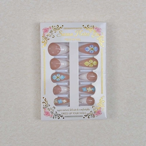 24pcs nude almond press-on nails with 3D floral carvings and pearls in a white gift box