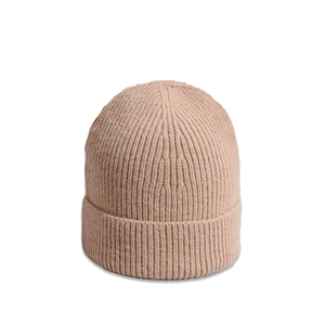 Detail of chunky ribbed knit texture and fold-over cuff on a beige winter beanie hat