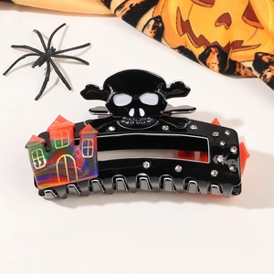 Close-up of Halloween shark clip with white skull and colorful haunted house decoration