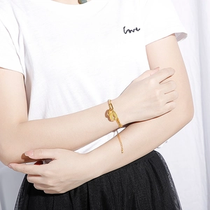 Gold stainless steel link chain bracelet with a round pendant for women and men