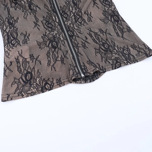 Detail of floral lace texture and sturdy metal zipper on a black corset top