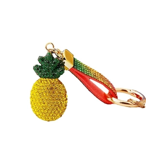 Diamond pineapple keychain with gold metal ring and colorful rhinestone leather strap