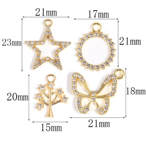 Golden alloy rhinestone charms set including star, tree, and butterfly for DIY jewelry