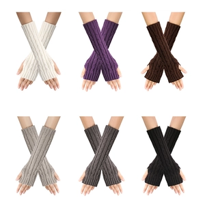 Detail display of knitted cable patterns on fingerless arm warmers in six various colors
