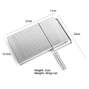 Detail showing stainless steel cheese slicer with size grid 21x12.5cm and cutting wire