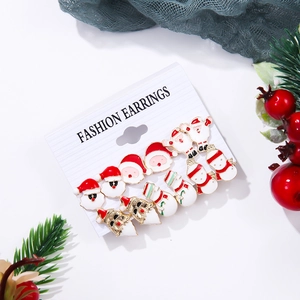 Christmas stud earring set featuring enamel Santa Claus and snowman on gold metal