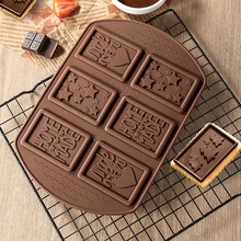 Macro view of a brown silicone brownie mold with 6 cavities and Home Made star patterns