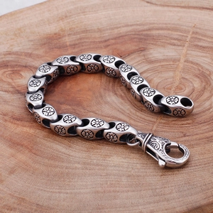 Vintage stainless steel men's bracelet with hollow floral links and engraved lobster clasp