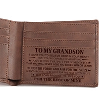 Close-up of laser engraved message to grandson on crazy horse leather wallet interior