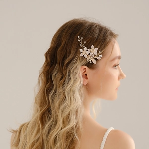 Elegant Chinese bridal hair clip with white handmade flowers and pearls on golden wire