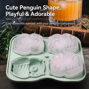 Silicone penguin ice cube mold with 4 slots and realistic texture for home drinks
