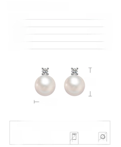 Detail view of 10mm shell pearl earrings in S925 silver with diamond accents