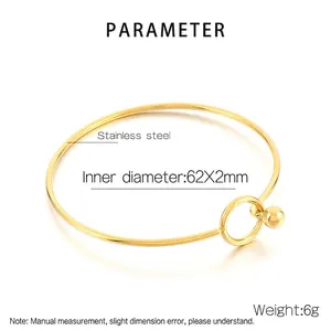Detail view of gold stainless steel bangle with 6g weight and 62x2mm dimensions