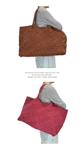 Macro detail of hand-woven suede leather texture on spacious tote bag in brown and magenta