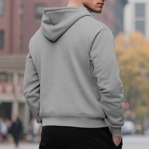 Men's grey hooded sweatshirt with ribbed cuffs and hem, back view on a city street background