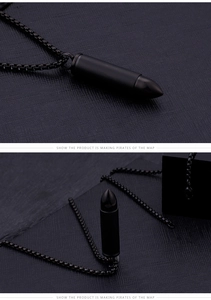 Close-up of black matte stainless steel bullet pendant necklace with matching box chain