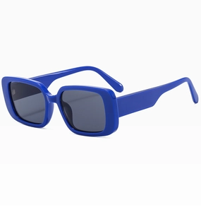 Detail view of bold blue square sunglasses featuring thick frames and dark lenses