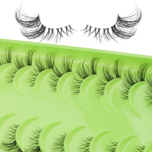 Macro shot of 10 pairs of wispy false eyelashes on a green tray showing fine fiber detail