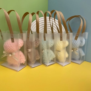 Five assorted bear plushies in translucent matte gift bags with brown carry ropes