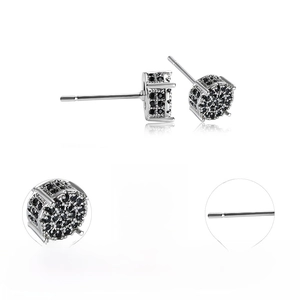 Macro detail of black zircon micro-pave studs with 14K white gold plating and earring backs