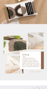 Detailed close-up of modern geometric tufted embroidery on cream boucle pillow cover