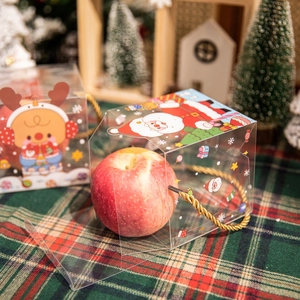 Christmas themed clear PVC apple gift box with Santa and deer patterns and gold handle