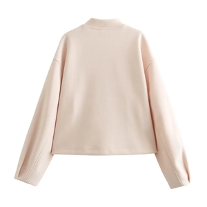 Back view of light pink drop-shoulder sweatshirt with long sleeves and ribbed cuffs