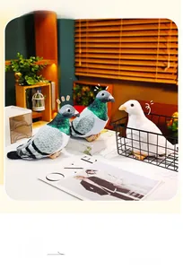 Detailed plush lifelike pigeons with realistic gradient neck feathers on a shelf