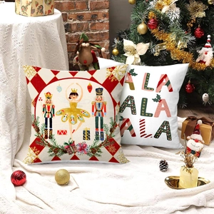 Christmas pillow covers with Nutcracker and festive lettering in cozy home holiday setting