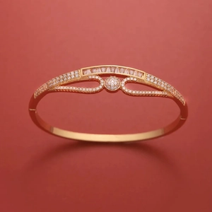 Golden copper bangle with sparkling pavé zircon and central sphere design for women