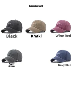 Detailed color display of five washed cotton baseball caps with cursive letter embroidery