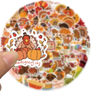 Detail of waterproof Thanksgiving turkey sticker featuring pumpkin and autumn leaves