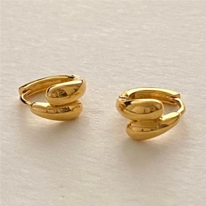 Elegant gold twisted hoop earrings with a streamlined minimalist design for women