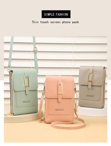 Detailed view of touchscreen crossbody phone bags in mint green, soft pink, and light grey