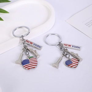 Double-sided New York keychain with Statue of Liberty and US flag heart pendant